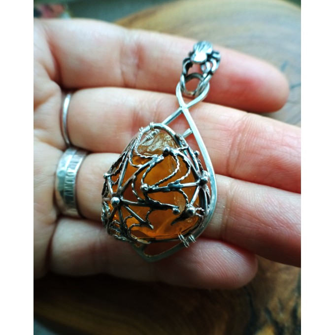 Silver filigree amber spider web necklace