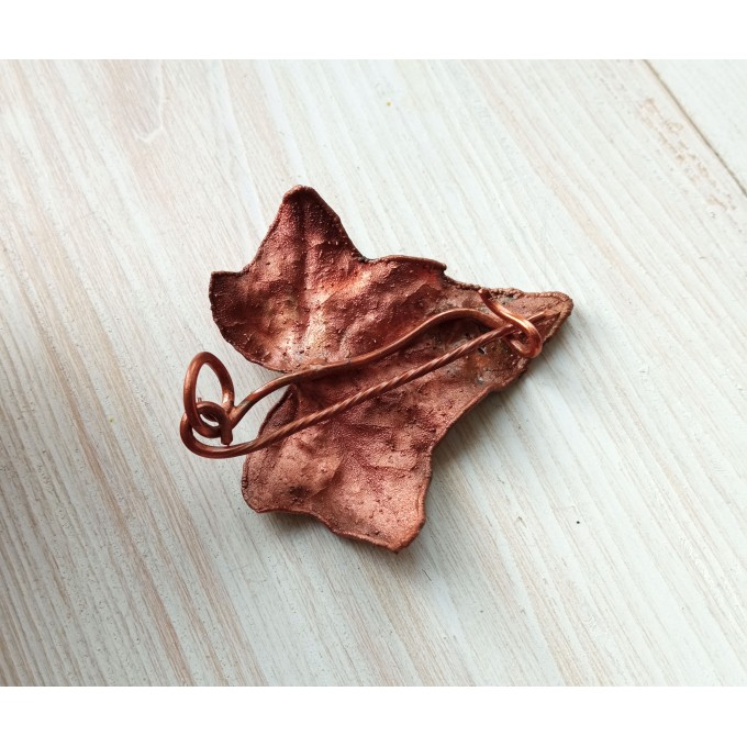 Copper maple leaf brooch
