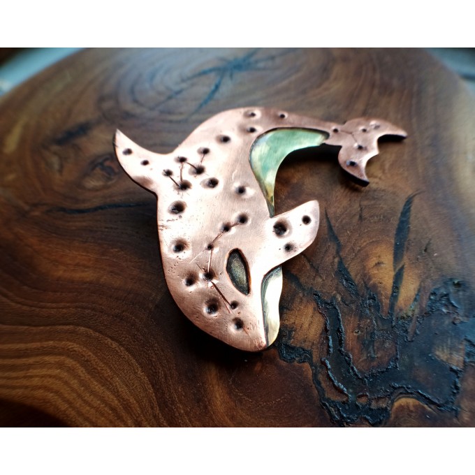 Copper killer whale brooch