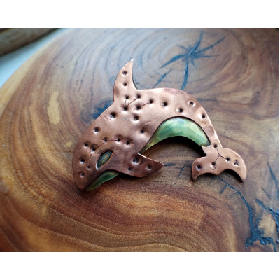 Copper killer whale brooch