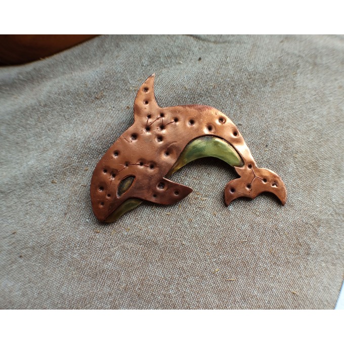 Copper killer whale brooch