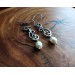 Silver earrings with white pearls