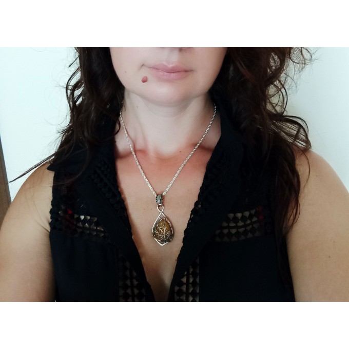 Silver filigree amber spider web necklace