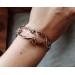 Wire wrap bracelet with copper feather and gemstone beads