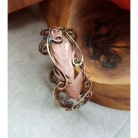 Wire wrap bracelet with copper feather and gemstone beads
