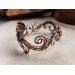 Wire wrap bracelet with copper feather and gemstone beads