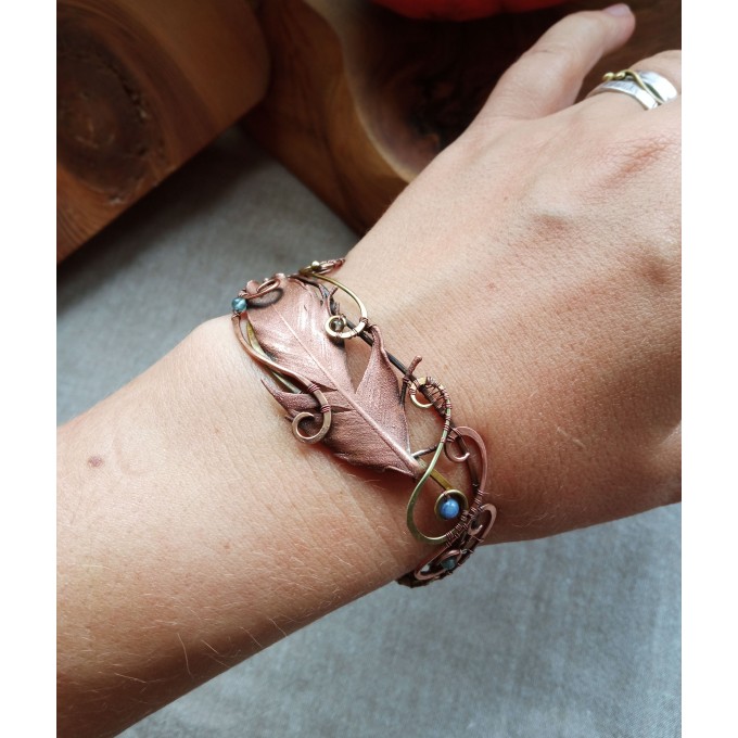 Wire wrap bracelet with copper feather and gemstone beads