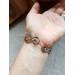 Wire wrap bracelet with copper feather and gemstone beads