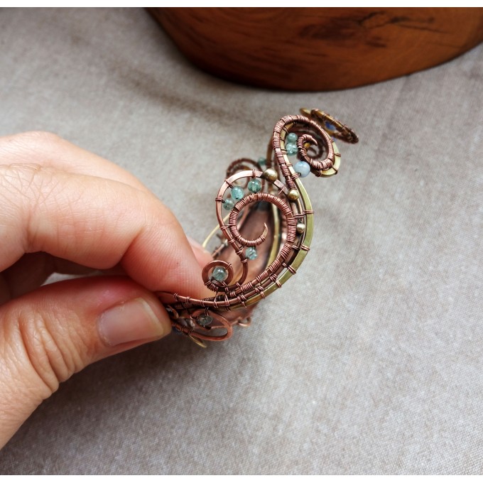 Wire wrap bracelet with copper feather and gemstone beads