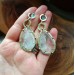 Brass earrings with quartz and apatite