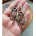 Gothic-style copper and brass filigree earrings