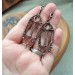 Gothic-style copper and brass filigree earrings