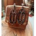 Gothic-style copper and brass filigree earrings