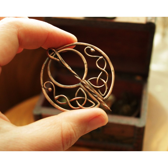 Copper celtic triquetra brooch