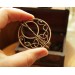 Copper celtic triquetra brooch