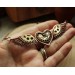 Steampunk necklace heart with wings