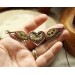 Steampunk necklace heart with wings