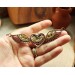 Steampunk necklace heart with wings