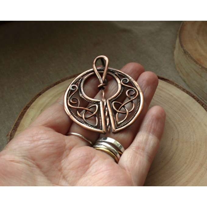 Copper celtic triquetra brooch