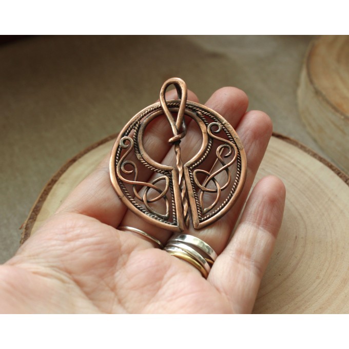 Copper celtic triquetra brooch