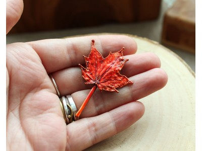 Copper maple leaf brooch