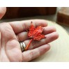 Copper maple leaf brooch