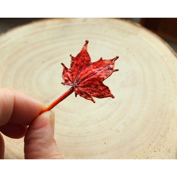 Copper maple leaf brooch