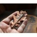 Copper oak brooch