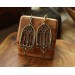 Gothic-style copper and brass filigree earrings