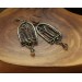 Gothic-style copper and brass filigree earrings