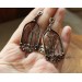 Gothic-style copper and brass filigree earrings