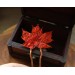 Hair pin with red maple leaf