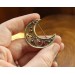 Copper and brass filigree moon broch