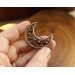 Copper and brass filigree moon broch