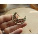 Copper and brass filigree moon broch