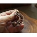 Copper filigree moon necklace