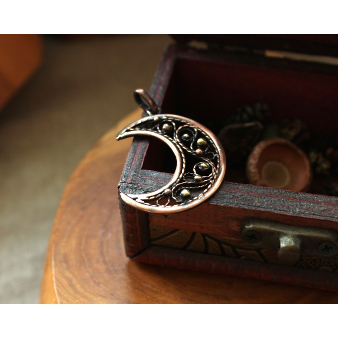 Copper filigree moon necklace