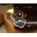 Copper filigree tree brooch with moss agate