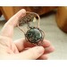 Copper filigree tree brooch with moss agate