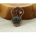 Copper filigree tree brooch with moss agate