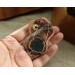 Copper filigree tree brooch with moss agate