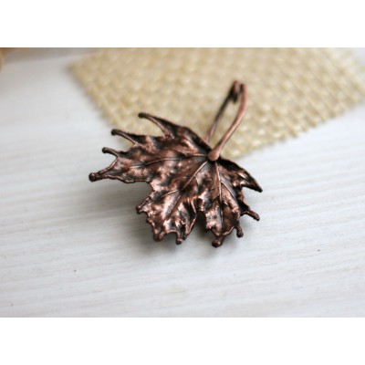 Copper maple leaf brooch