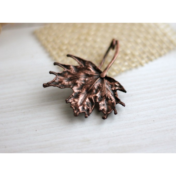 Copper maple leaf brooch