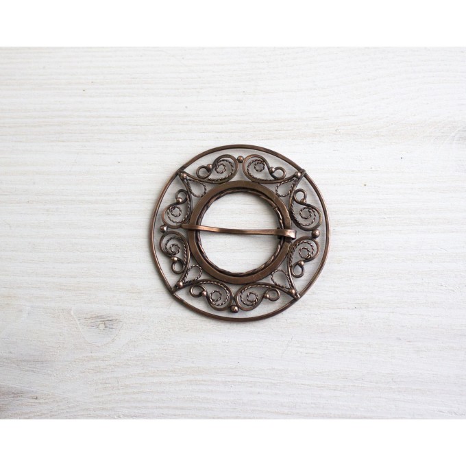 Copper filigree brooch