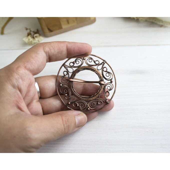 Copper filigree brooch