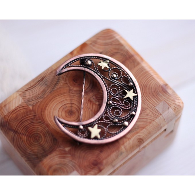 Copper filigree moon broch