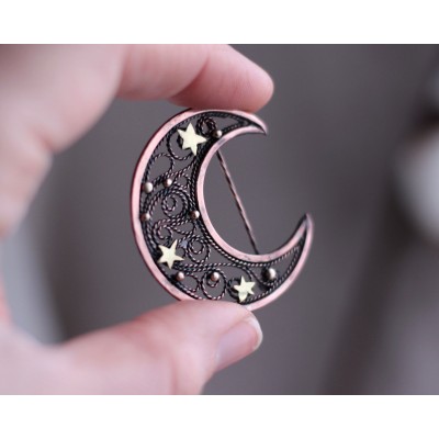 Copper filigree moon broch