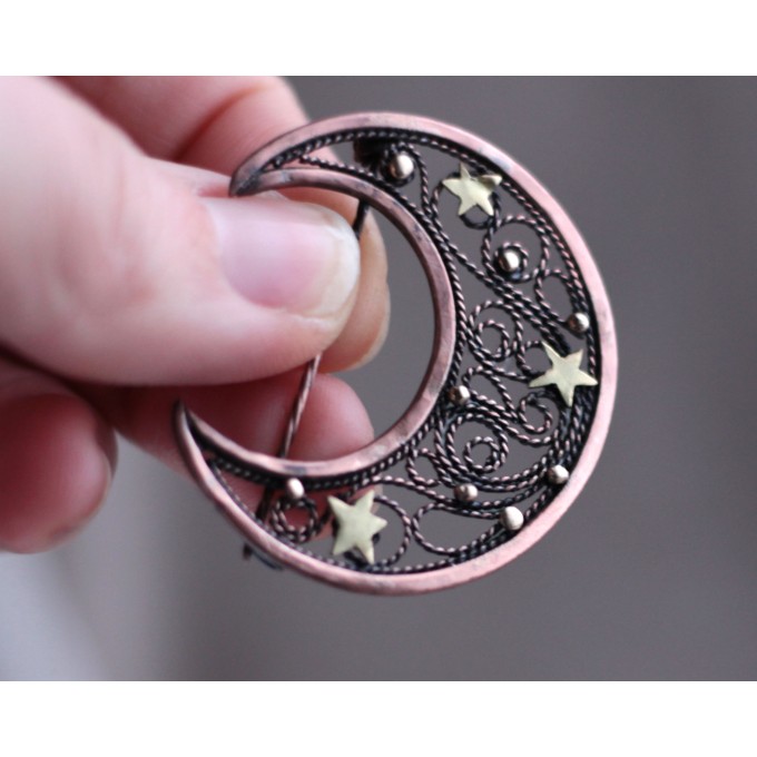 Copper filigree moon broch
