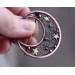 Copper filigree moon broch