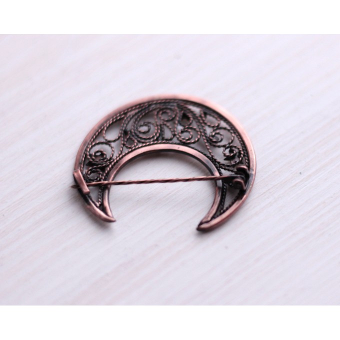 Copper filigree moon broch